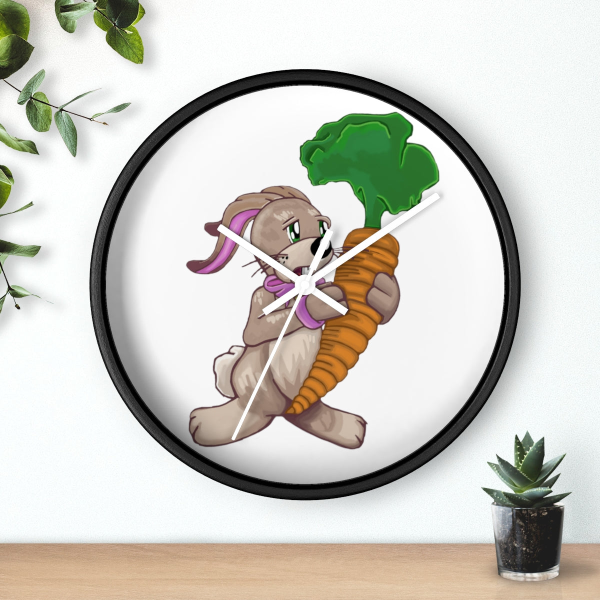 A whimsical wall clock featuring a bunny holding a carrot, set in a wooden frame with a clear plexiglass face.