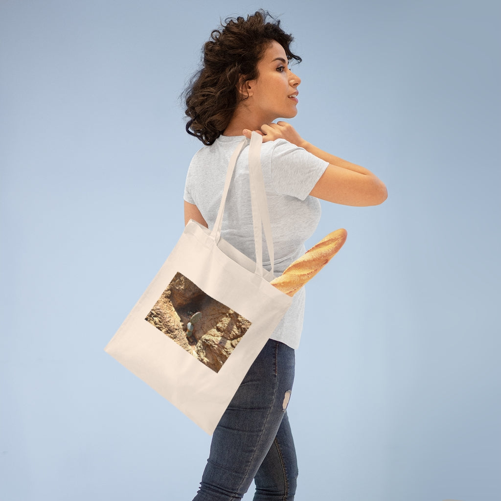 A stylish Cactus Tote Bag made of 100% cotton, featuring cross-stitched handles and available in various colors.