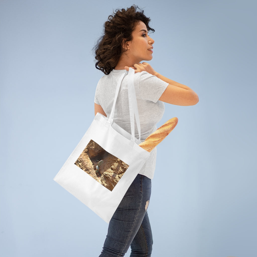 A stylish Cactus Tote Bag made of 100% cotton, featuring cross-stitched handles and available in various colors.