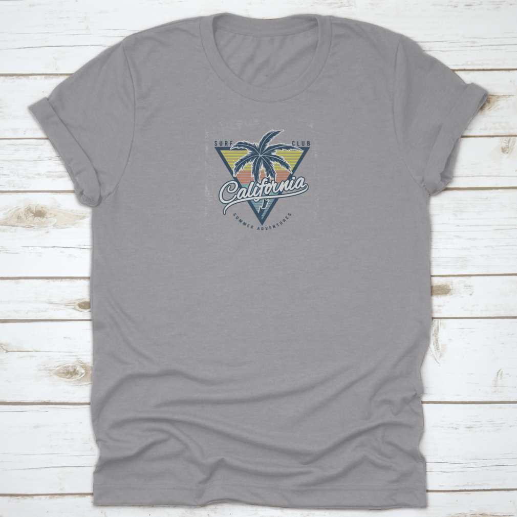 California Surf Club Summer Adventure Typography Tee featuring a palm tree design, made from 100% cotton, perfect for summer wear.