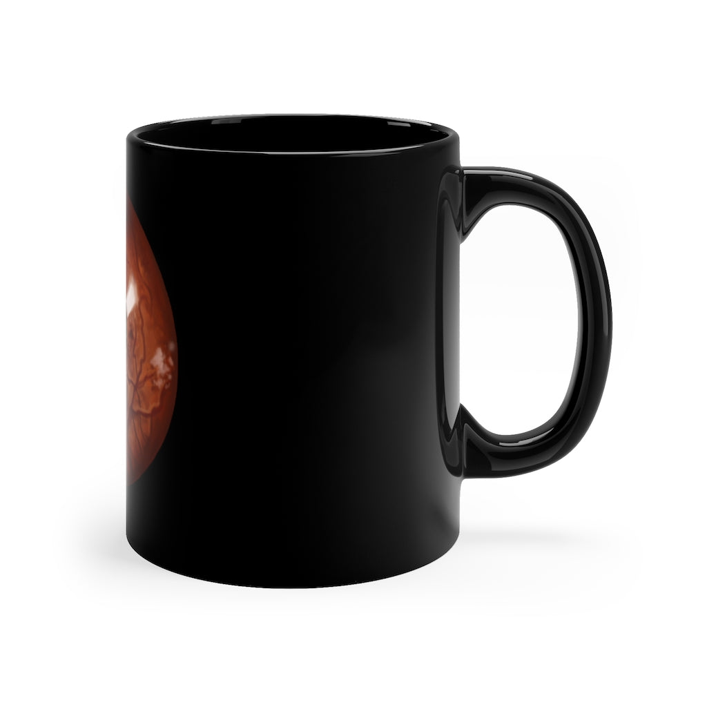 A stylish Cat Eyes 11oz black ceramic mug with a C-handle, perfect for coffee, tea, or hot chocolate.