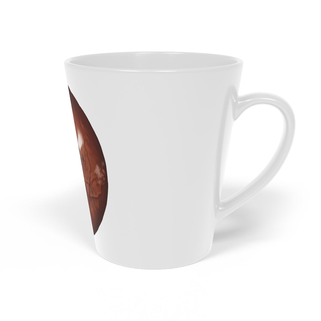 A stylish Cat Eyes Latte Mug featuring a playful cat eyes design, made of durable white ceramic with a comfortable C-shaped handle.