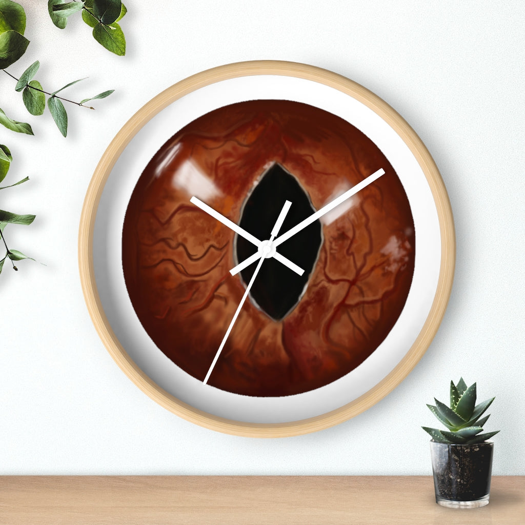 A stylish Cat Eyes Wall Clock featuring a wooden frame and a playful cat design, perfect for indoor decoration.