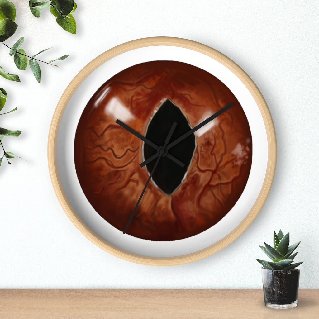 A stylish Cat Eyes Wall Clock featuring a wooden frame and a playful cat design, perfect for indoor decoration.