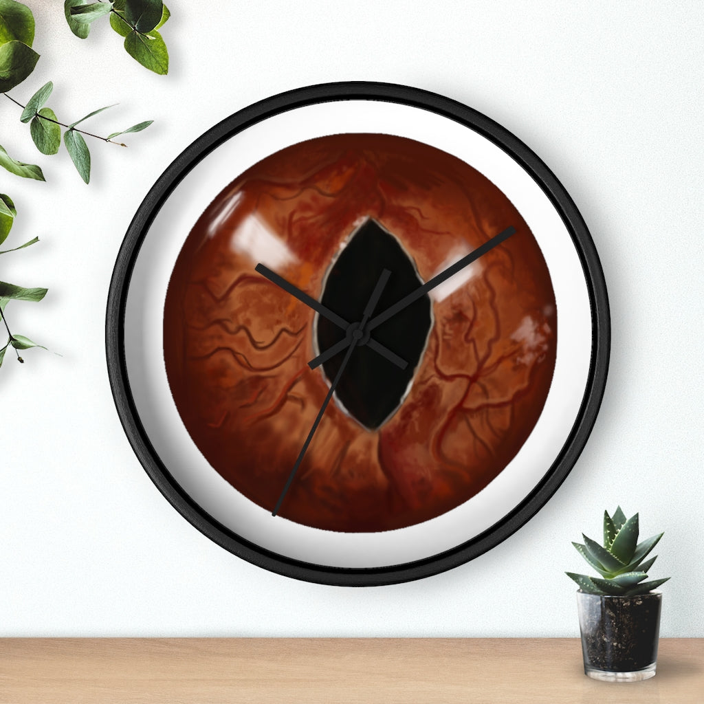 A stylish Cat Eyes Wall Clock featuring a wooden frame and a playful cat design, perfect for indoor decoration.