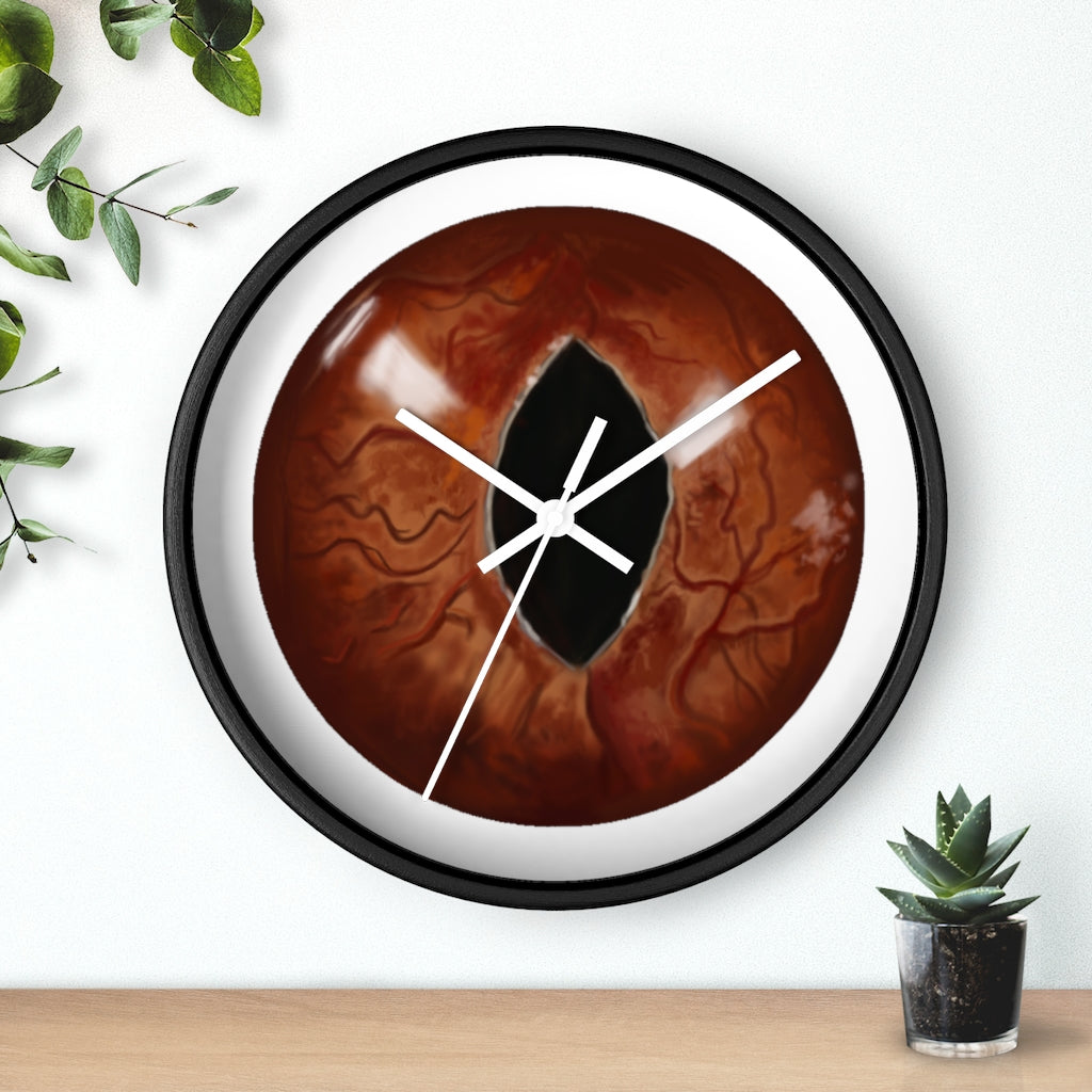 A stylish Cat Eyes Wall Clock featuring a wooden frame and a playful cat design, perfect for indoor decoration.