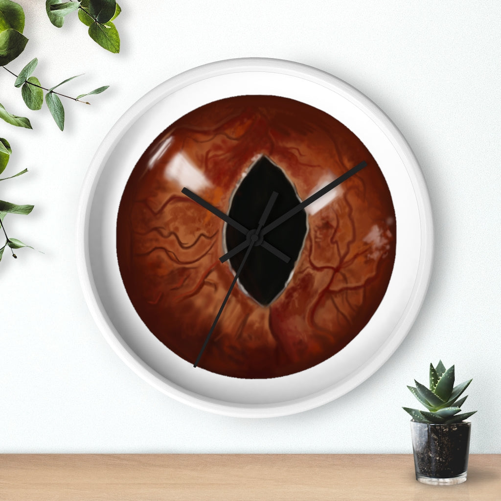 A stylish Cat Eyes Wall Clock featuring a wooden frame and a playful cat design, perfect for indoor decoration.