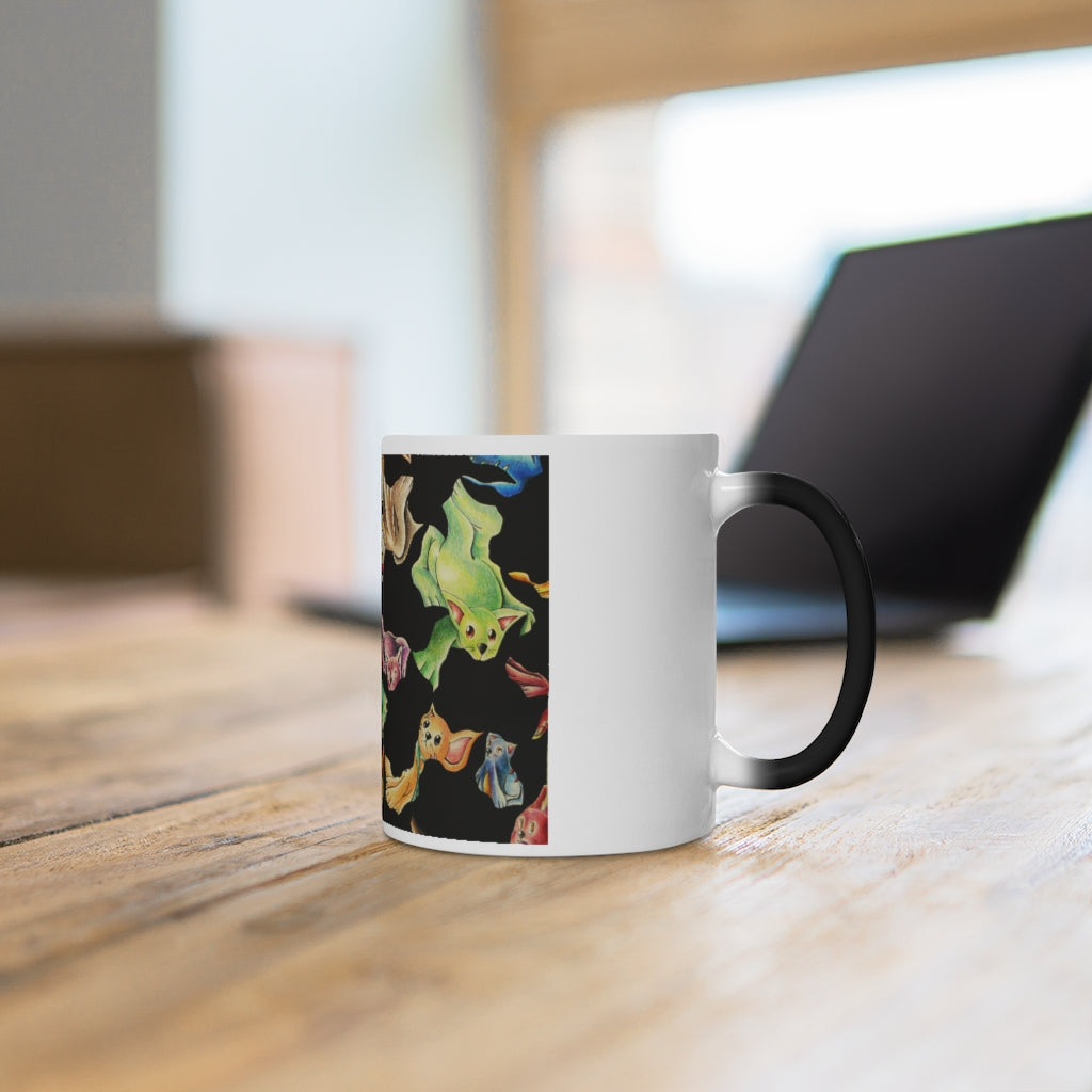 A whimsical cat pattern color changing mug showcasing vibrant colors when filled with hot liquid.