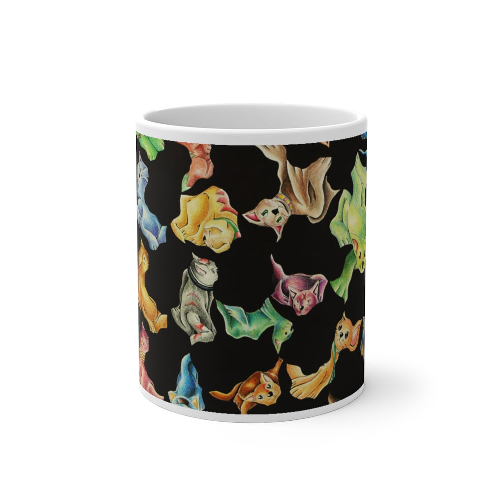 A whimsical cat pattern color changing mug showcasing vibrant colors when filled with hot liquid.