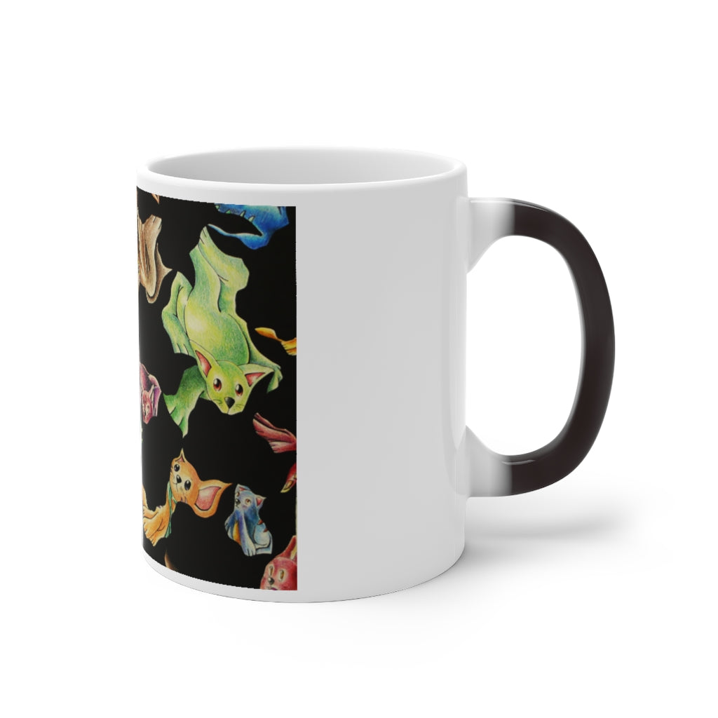 A whimsical cat pattern color changing mug showcasing vibrant colors when filled with hot liquid.