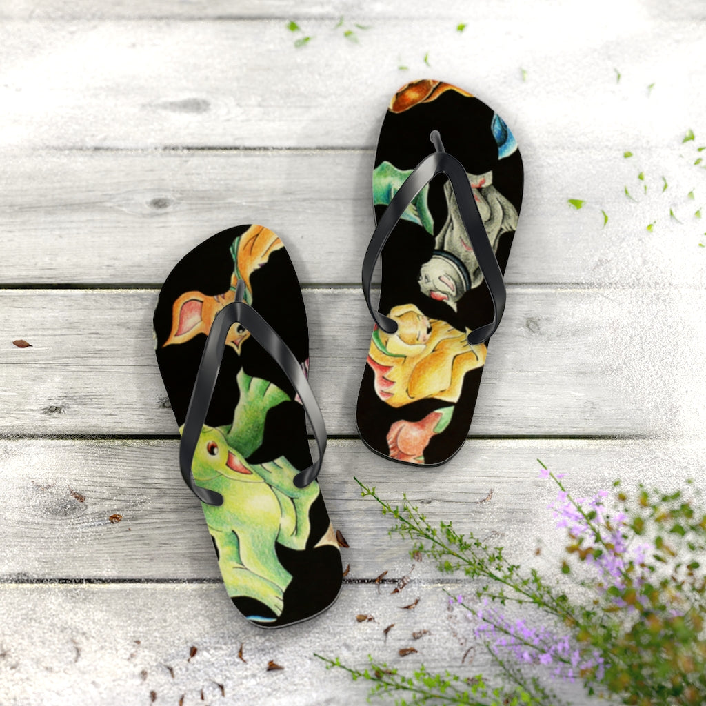 A pair of Cat Pattern Flip Flops featuring vibrant cat designs, cushioned footbed, and black PVC strap, perfect for summer wear.