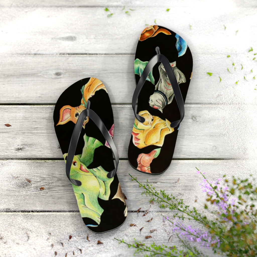 A pair of Cat Pattern Flip Flops featuring vibrant cat designs, cushioned footbed, and black PVC strap, perfect for summer wear.