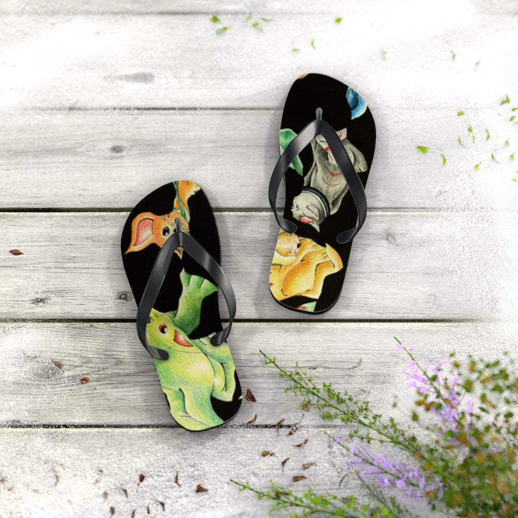 A pair of Cat Pattern Flip Flops featuring vibrant cat designs, cushioned footbed, and black PVC strap, perfect for summer wear.