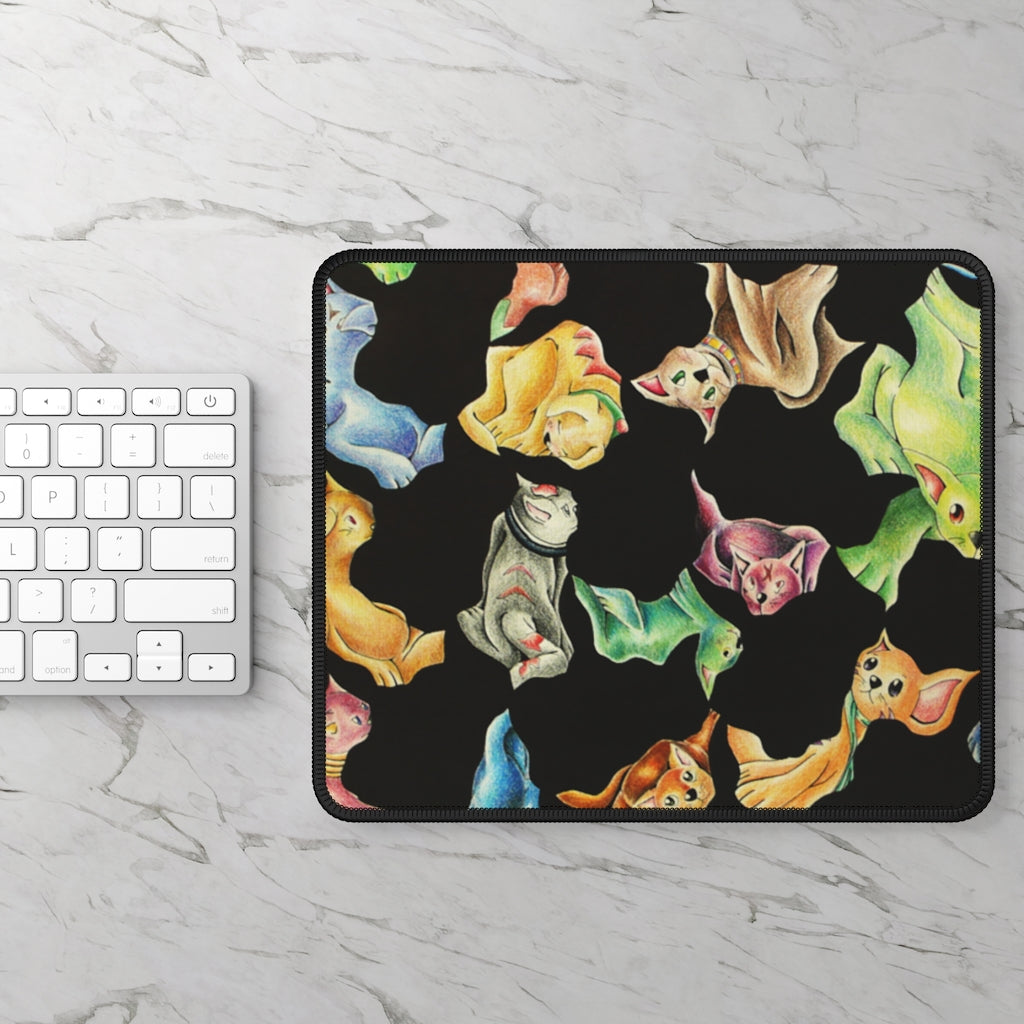 A colorful cat pattern gaming mouse pad, measuring 9x7 inches, featuring stitched edges for durability and a smooth surface for optimal mouse performance.