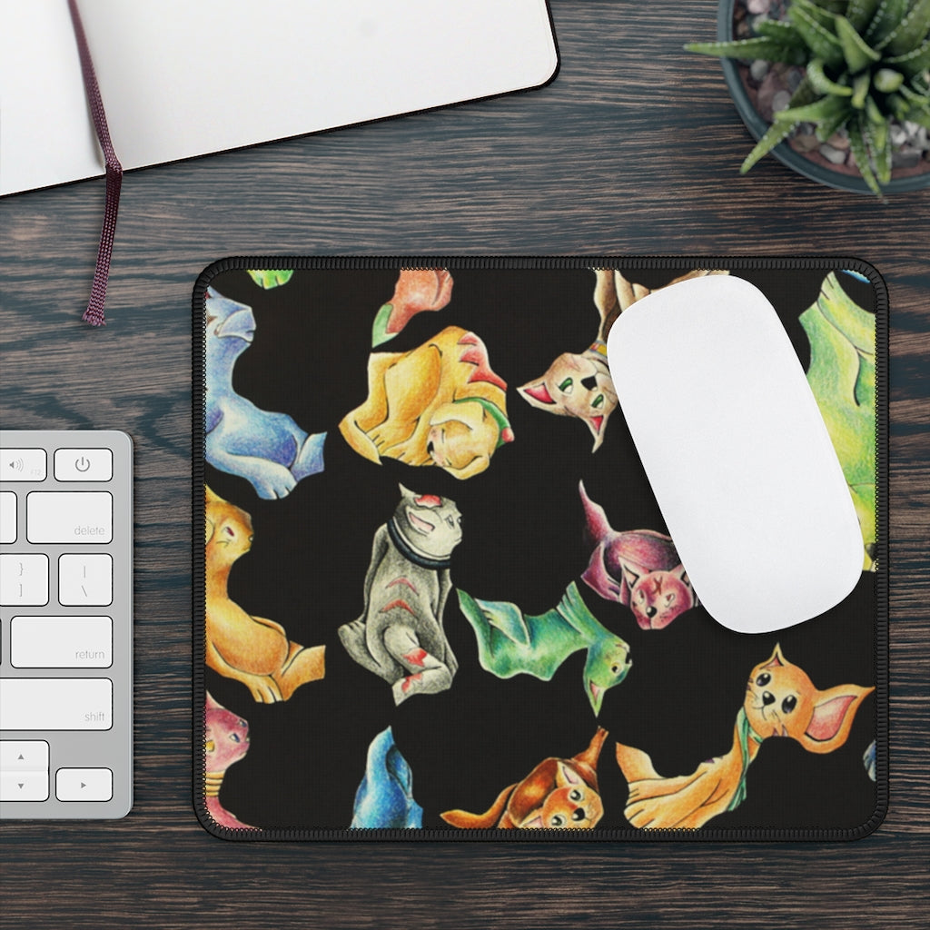 A colorful cat pattern gaming mouse pad, measuring 9x7 inches, featuring stitched edges for durability and a smooth surface for optimal mouse performance.