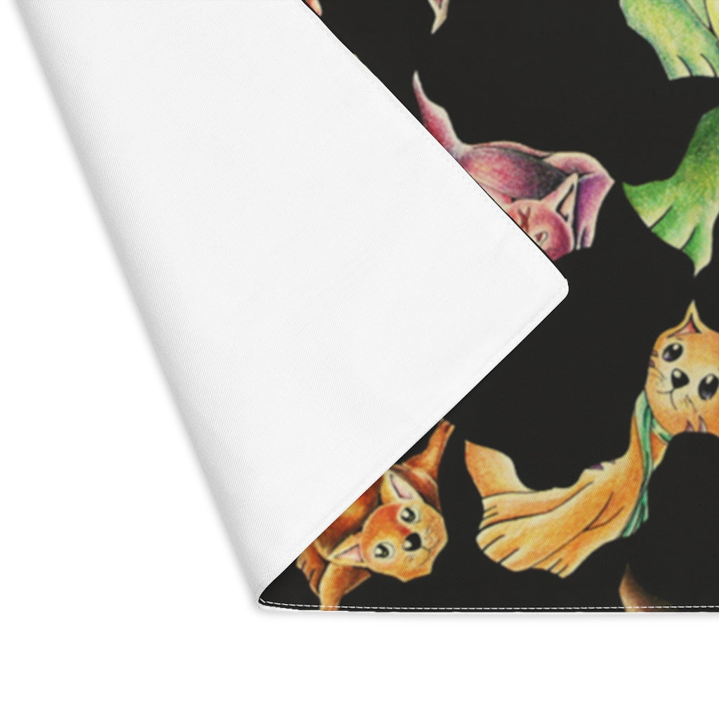 A colorful cat pattern placemat featuring a playful design, made from durable cotton, suitable for dining tables.