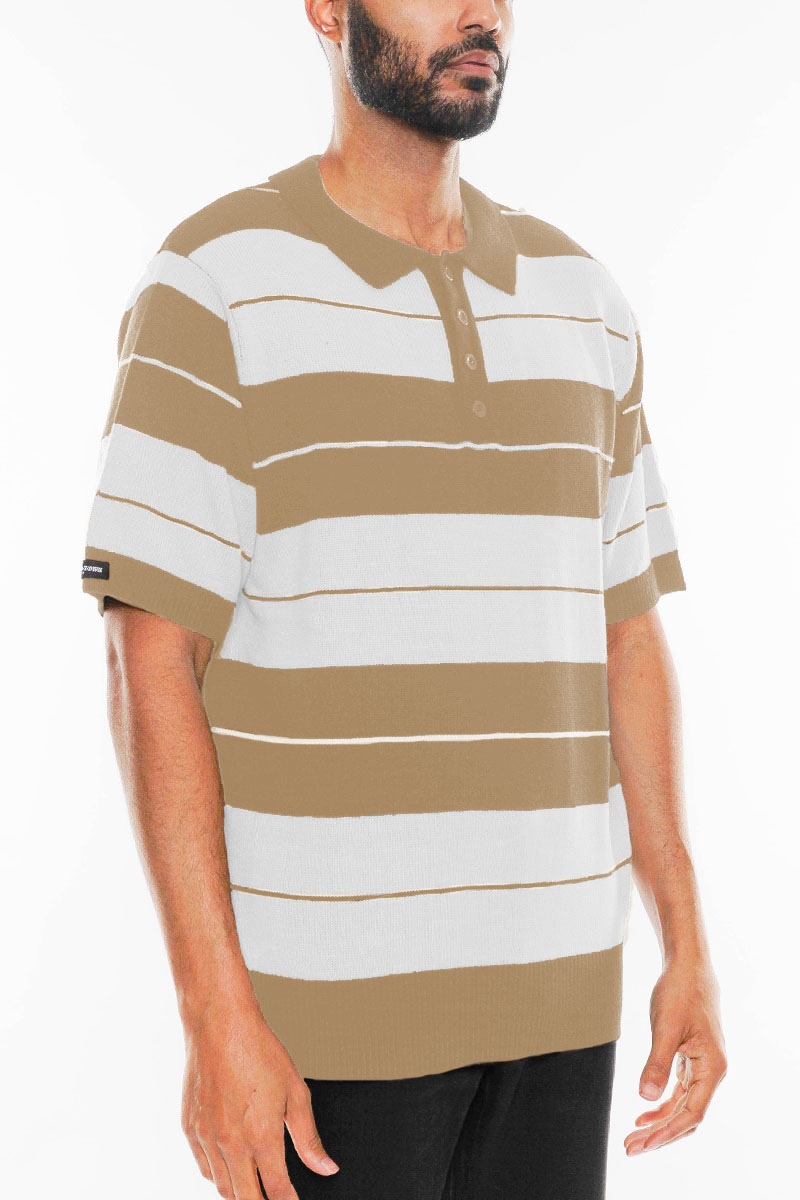 CB Striped Knit Polo featuring classic Charlie Brown stripes in a stylish design, made from 100% acrylic.