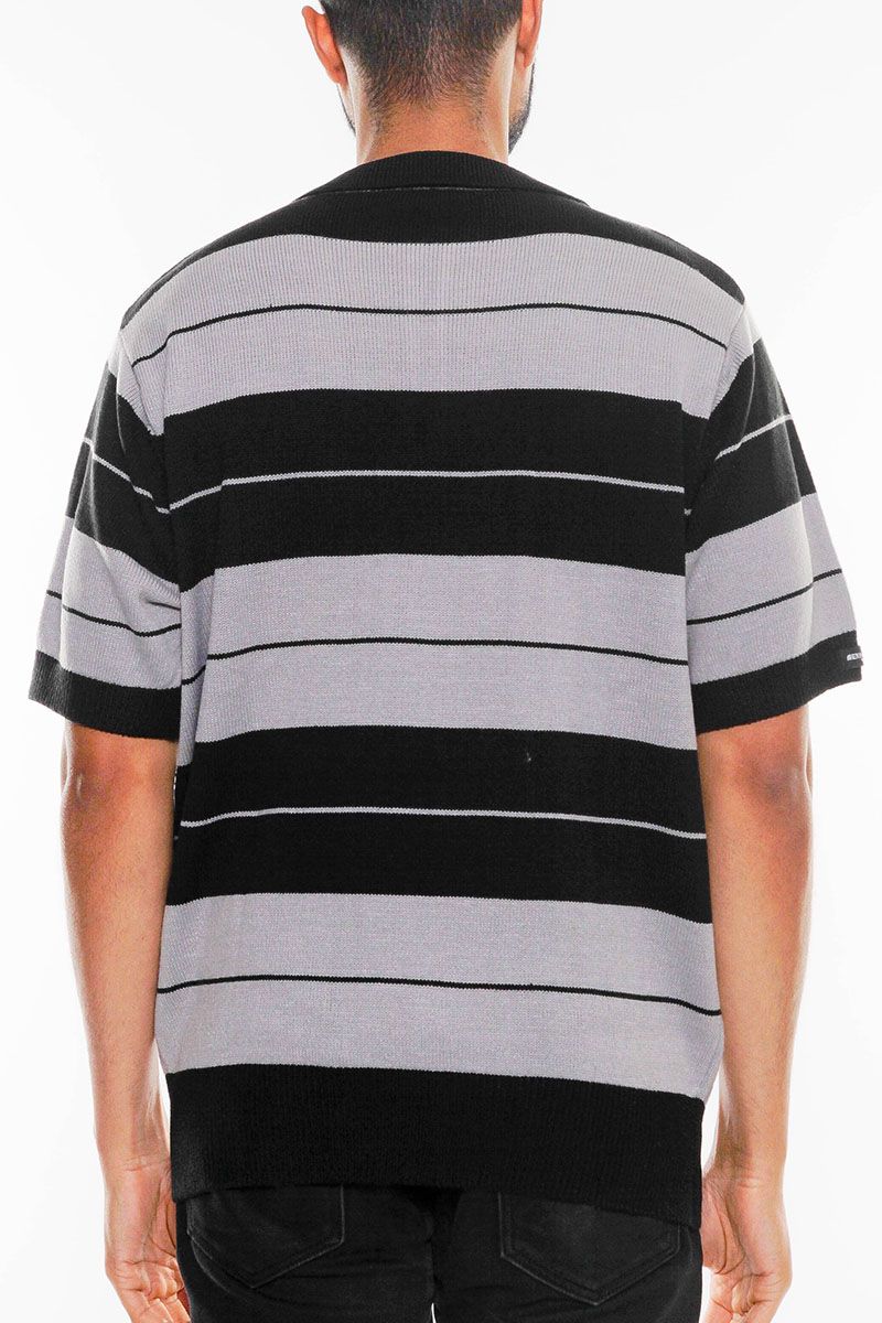 CB Striped Knit Polo featuring classic stripes and a comfortable fit, made from 100% acrylic.