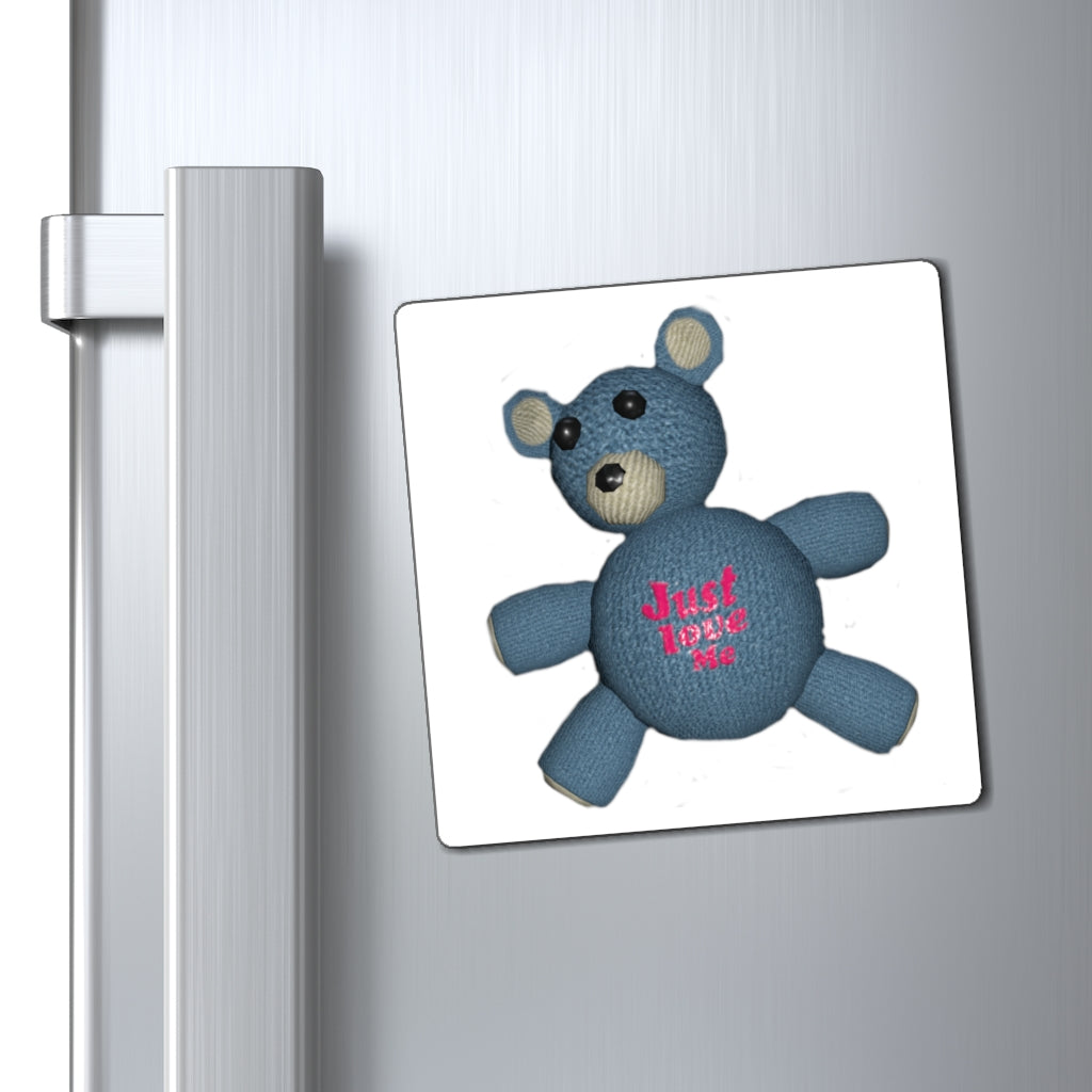 CG Bear Magnets displayed on a metallic surface, showcasing their strong hold and stylish black backing.