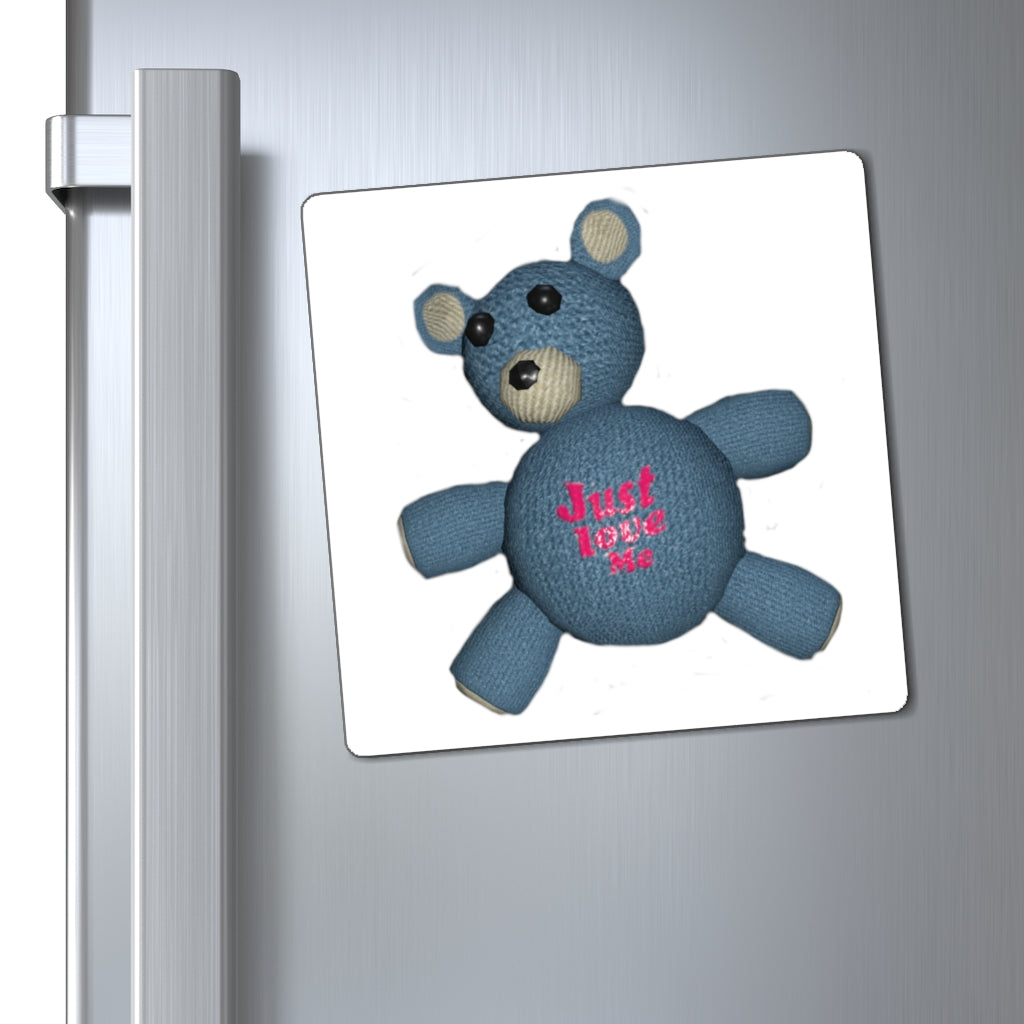 CG Bear Magnets displayed on a metallic surface, showcasing their strong hold and stylish black backing.