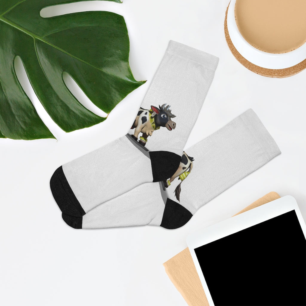 A pair of CG Cow DTG Socks featuring a vibrant design, made from a blend of recycled materials, showcasing their 200 needle knit quality.