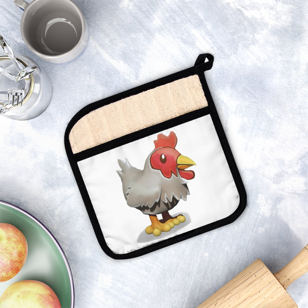 A stylish Chicken Pot Holder with Pocket, measuring 9x9 inches, featuring a black cotton hanging loop and designed for heat resistance up to 400F.