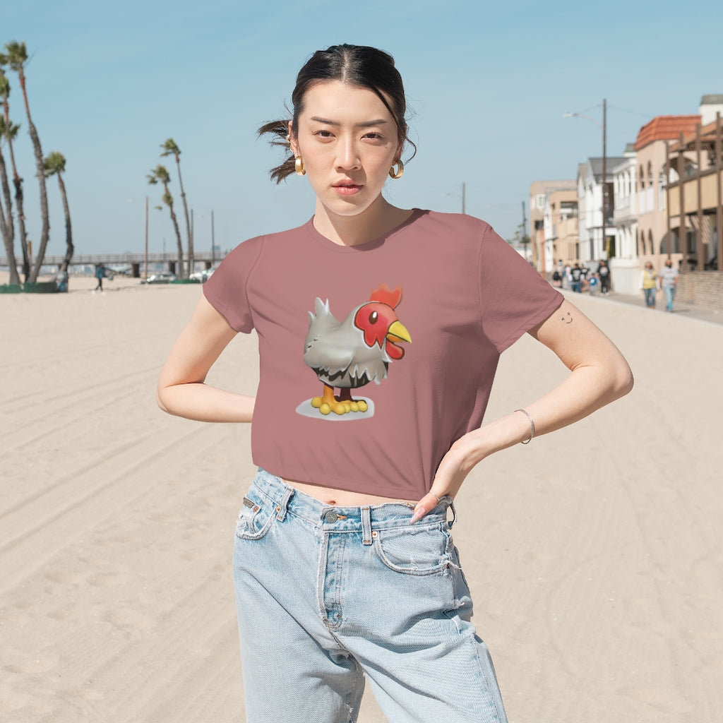 A stylish Chicken Women's Flowy Cropped Tee in a vibrant color, showcasing its flowy fit and modest crop design.