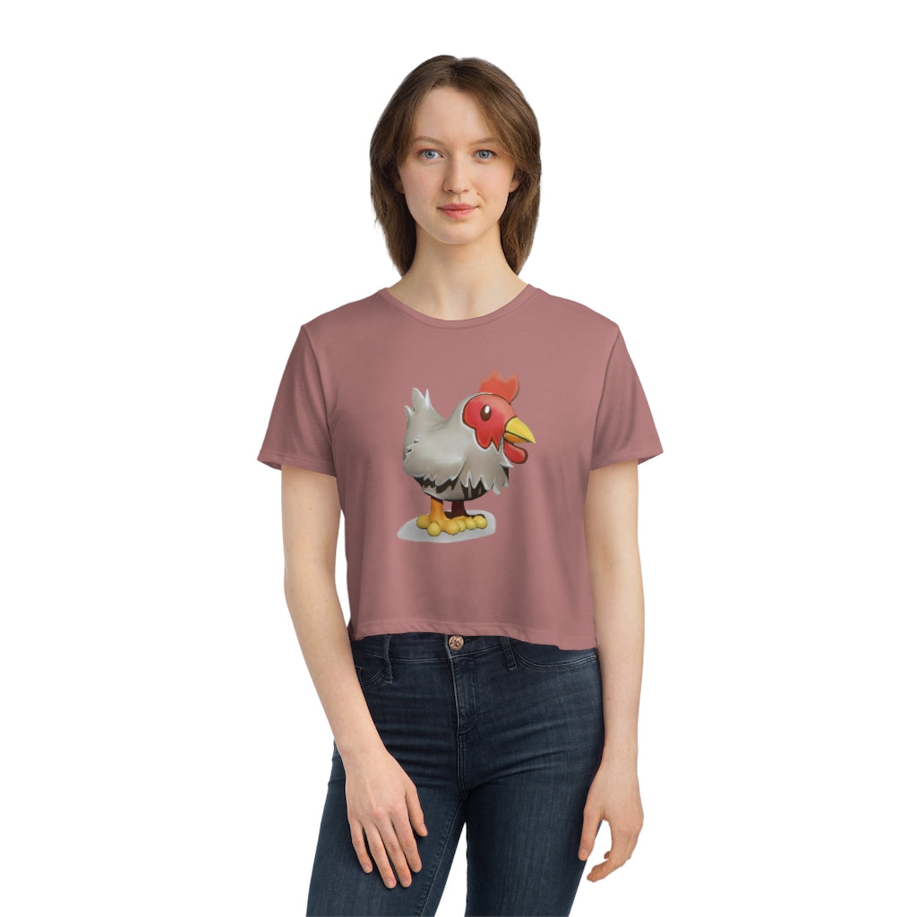 A stylish Chicken Women's Flowy Cropped Tee in a vibrant color, showcasing its flowy fit and modest crop design.