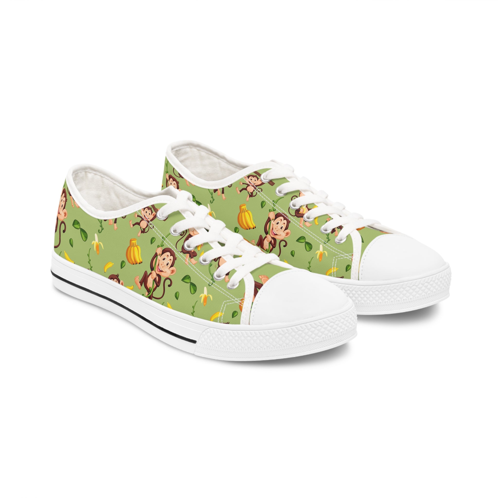 Chimpanzee Pattern Women's Low Top Sneakers featuring breathable canvas and memory foam insoles, available in black or white soles.