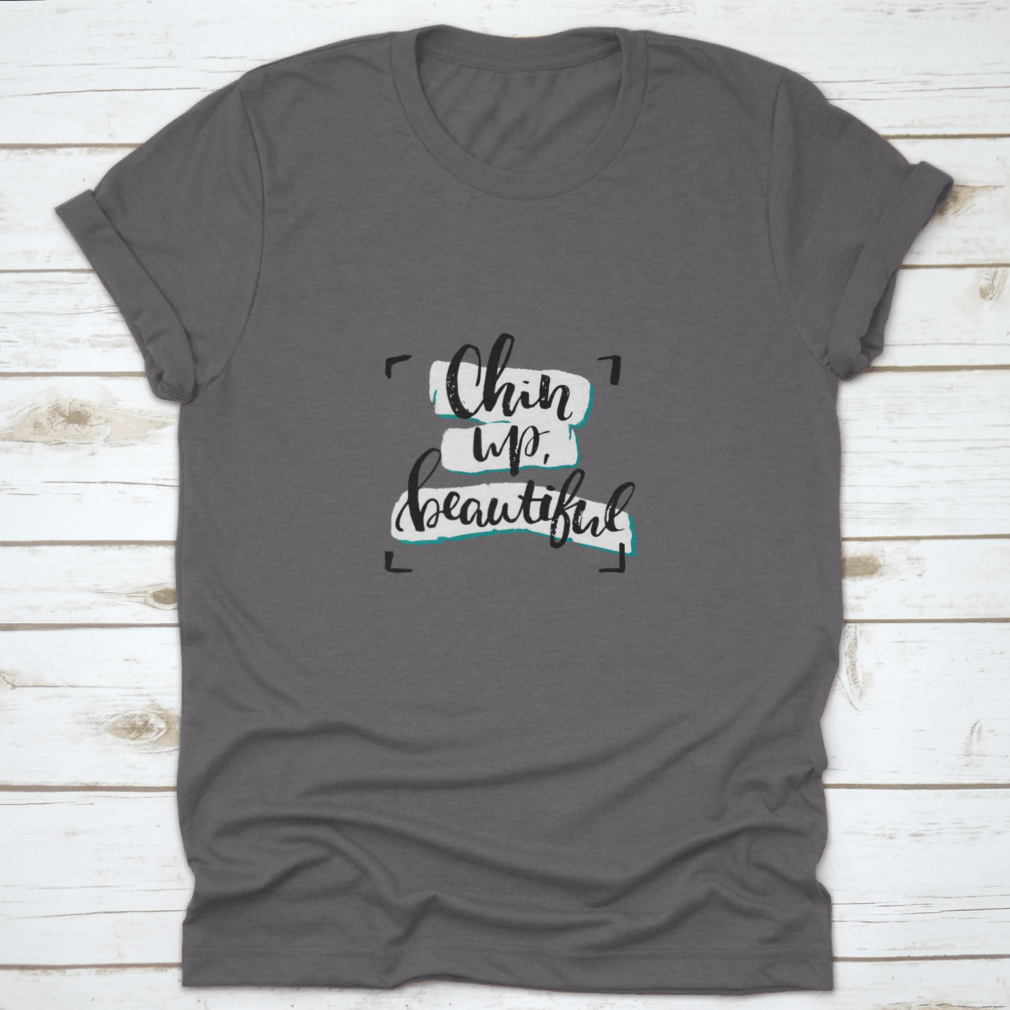 Chin Up, Beautiful Inspirational Design T-Shirt in various colors, showcasing its soft fabric and motivational message.