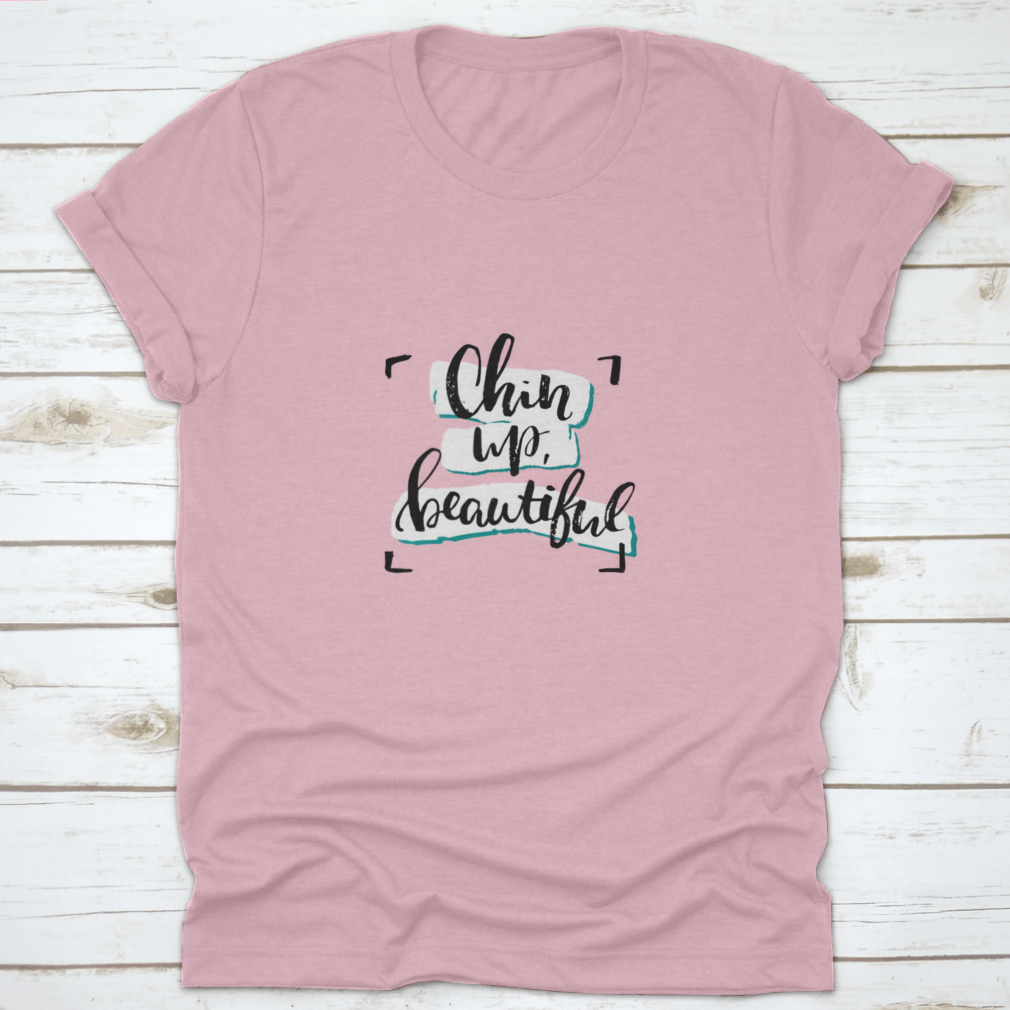 Chin Up, Beautiful Inspirational Design T-Shirt in various colors, showcasing its soft fabric and motivational message.