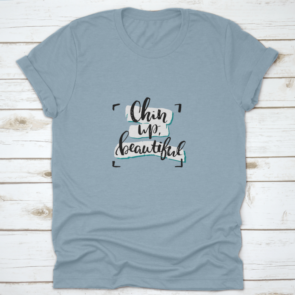 Chin Up, Beautiful Inspirational Design T-Shirt in various colors, showcasing its soft fabric and motivational message.