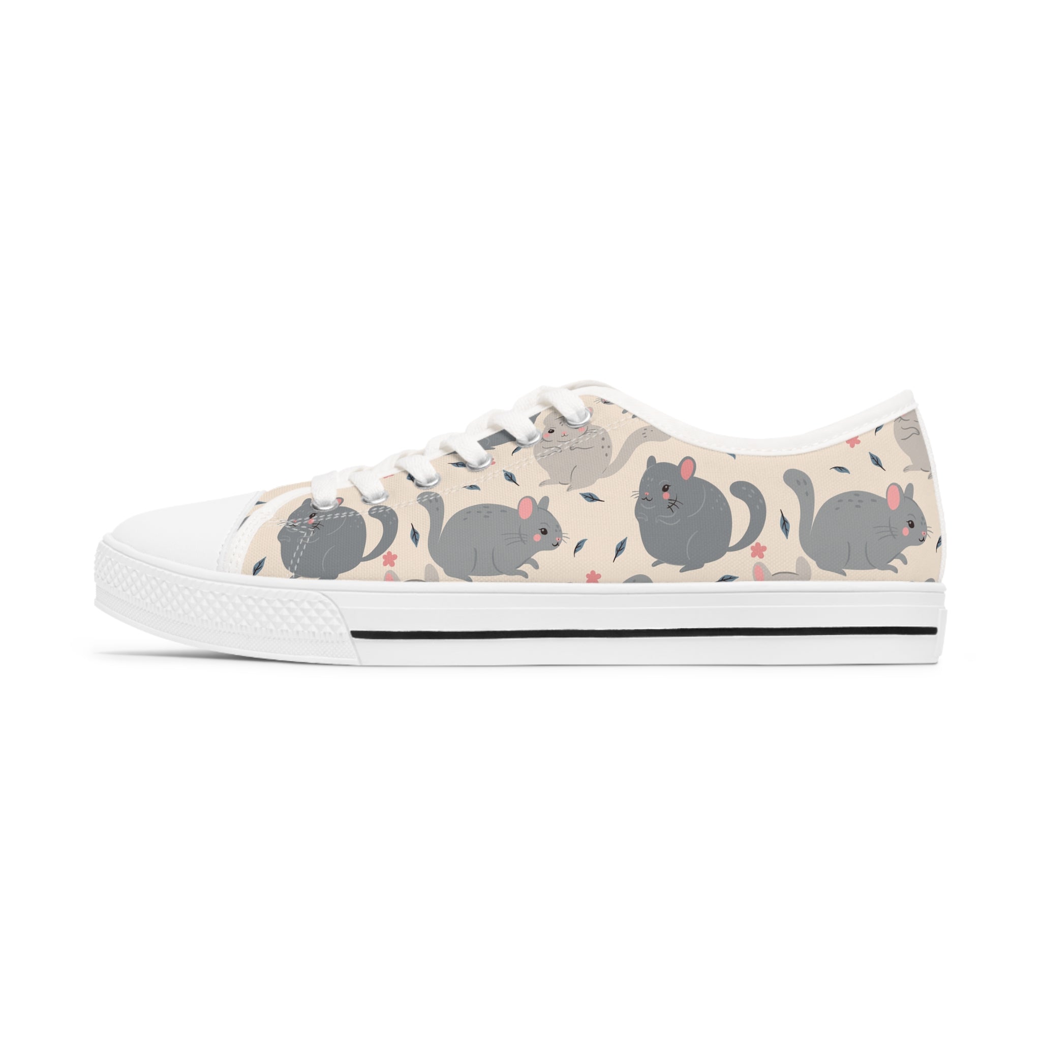 Chinchilla Women's Low Top Sneakers in black and white, showcasing breathable canvas and stylish design with silver metal eyelets.