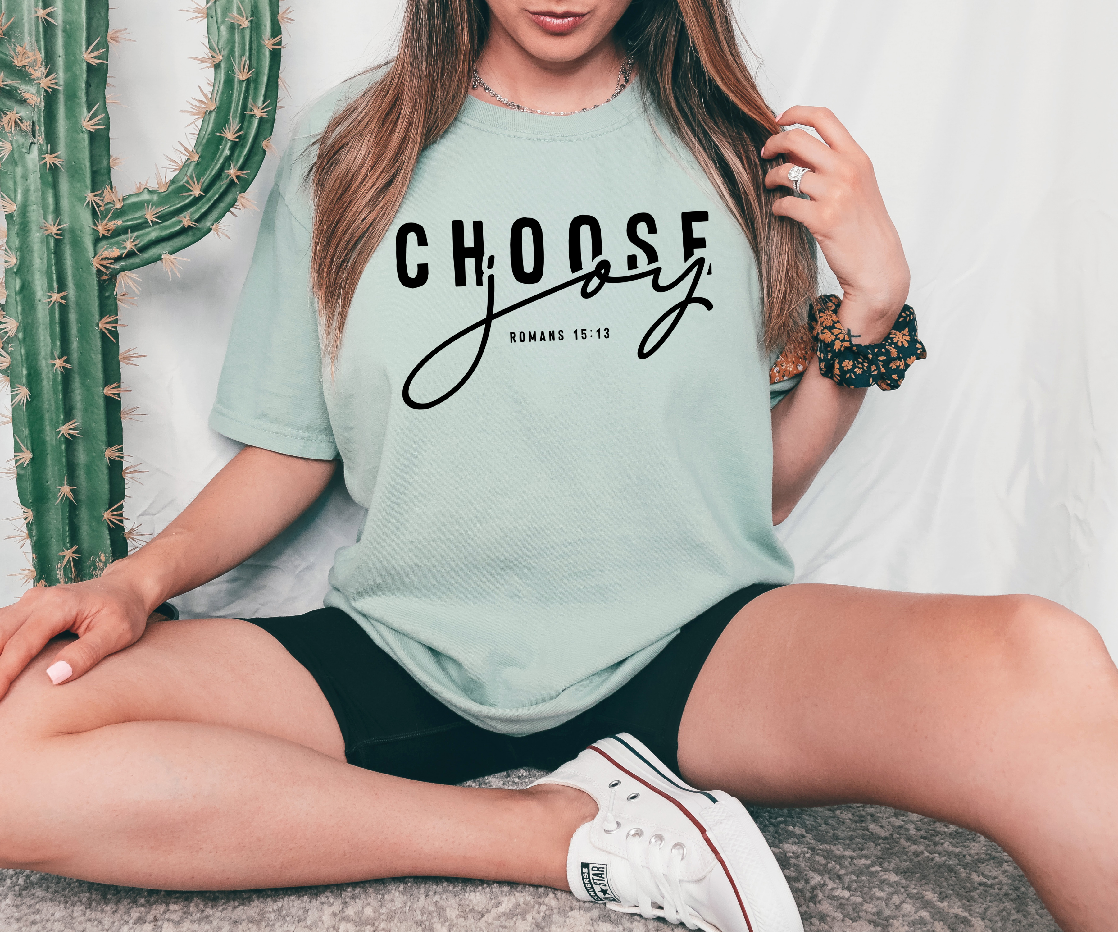 Choose Joy T-shirt made from premium ring spun cotton, featuring a vibrant flex print design, available in various sizes.