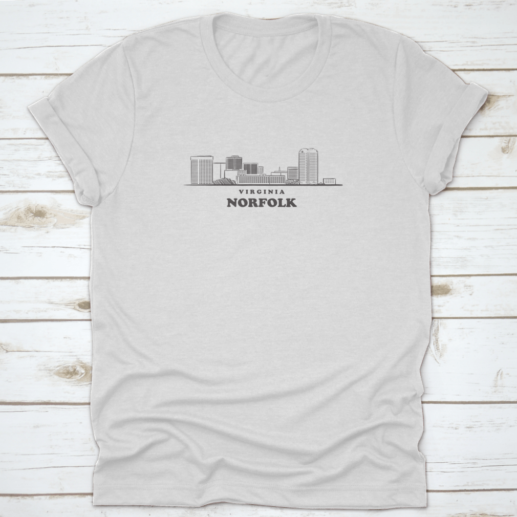 A stylish shirt featuring a drawn sketch vector illustration of the Norfolk, Virginia skyline, showcasing iconic buildings and structures.