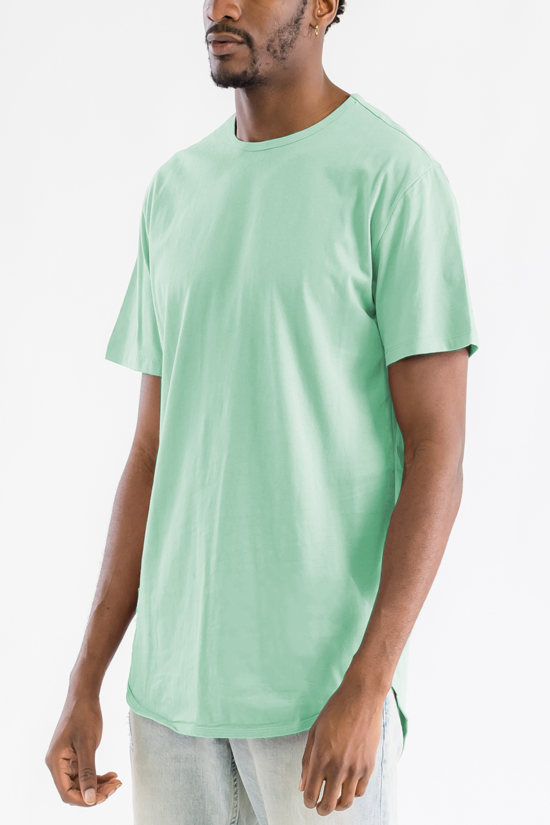 A stylish Classic Rounded Scallop Tee featuring a scalloped hem design, made from 100% cotton, displayed on a mannequin.