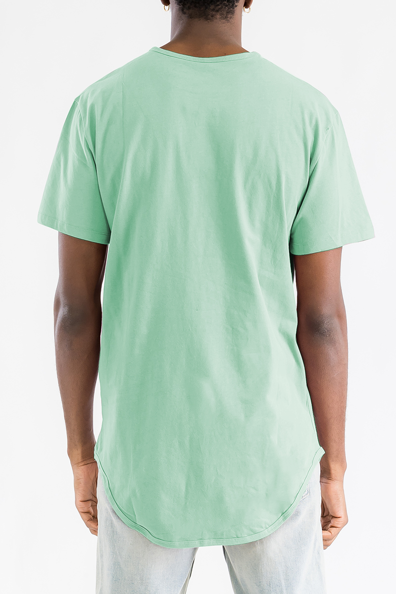 A stylish Classic Rounded Scallop Tee featuring a scalloped hem design, made from 100% cotton, displayed on a mannequin.