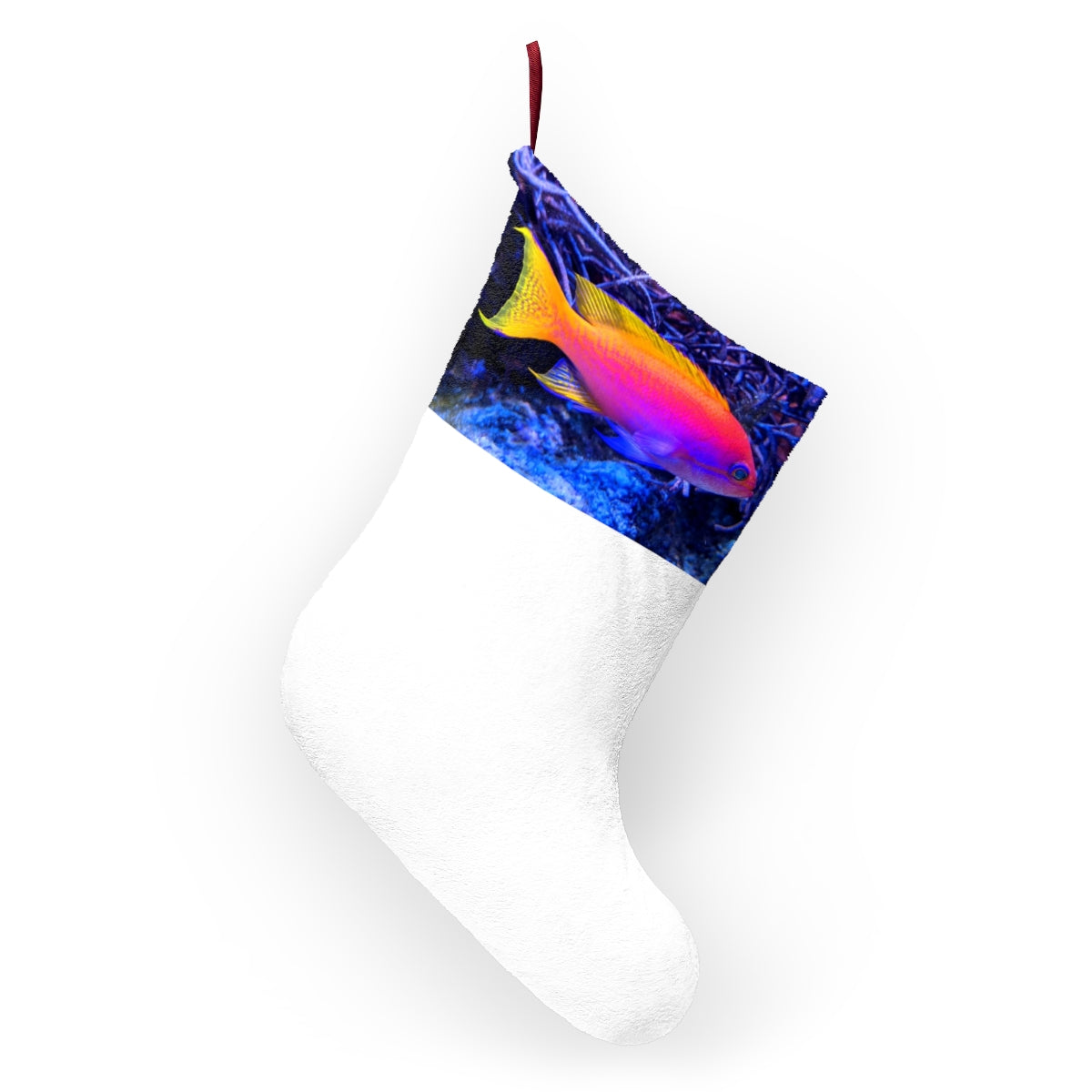 Colorful fish-themed Christmas stockings hanging by a fireplace, showcasing vibrant designs and personalization options.