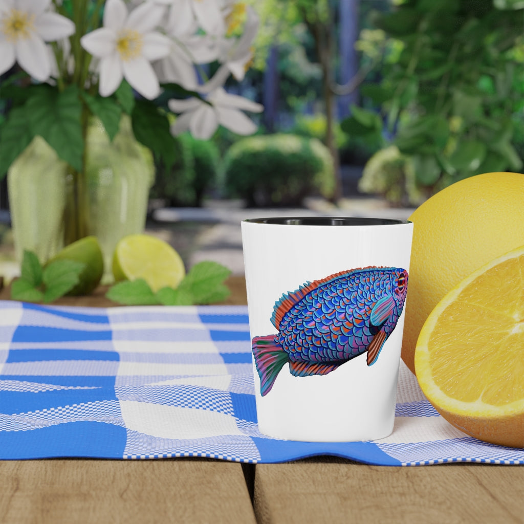 A stylish Colored Fish Shot Glass made of ceramic, featuring a customizable design with a white or black interior, perfect for gatherings and events.