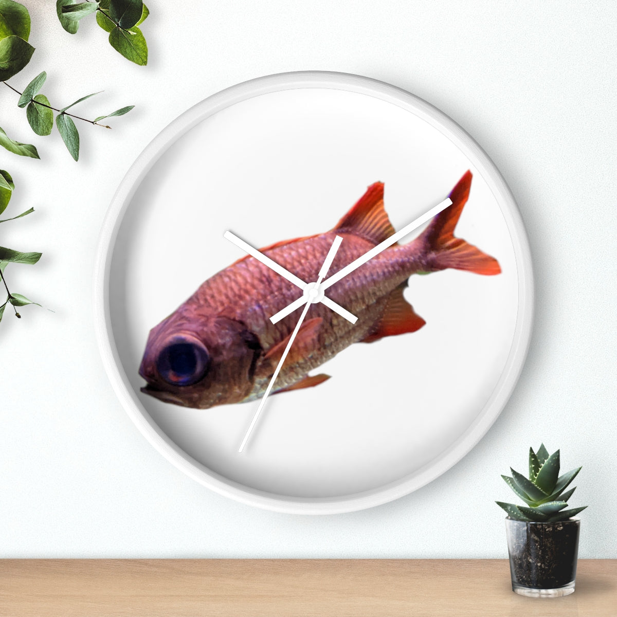 A colorful wall clock featuring a vibrant fish design, set in a wooden frame with a clear plexiglass face.