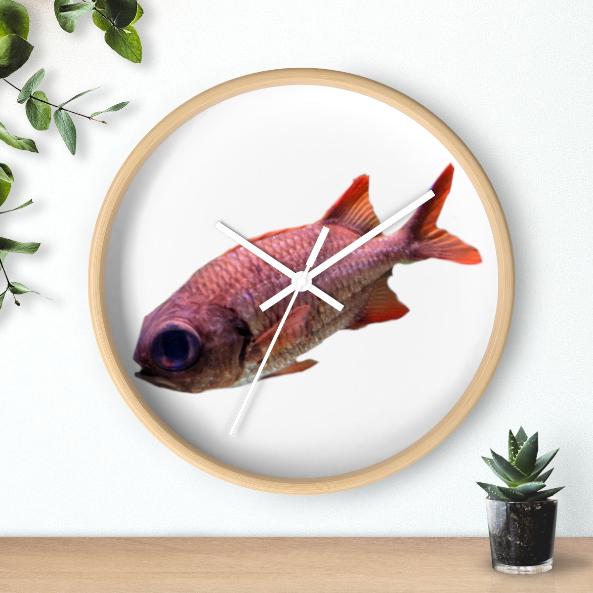 A colorful wall clock featuring a vibrant fish design, set in a wooden frame with a clear plexiglass face.