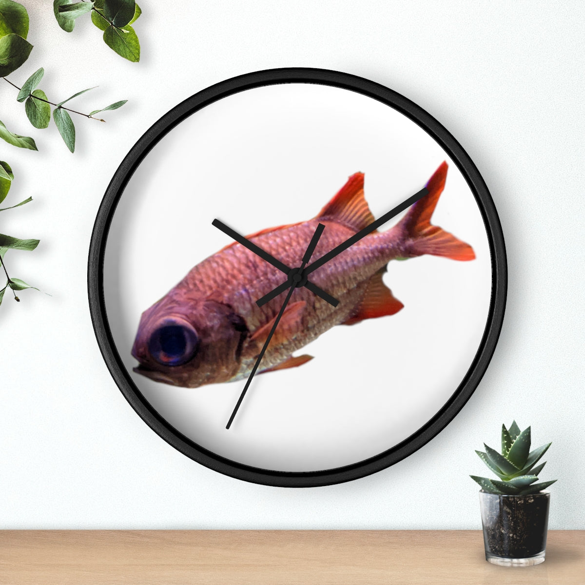 A colorful wall clock featuring a vibrant fish design, set in a wooden frame with a clear plexiglass face.