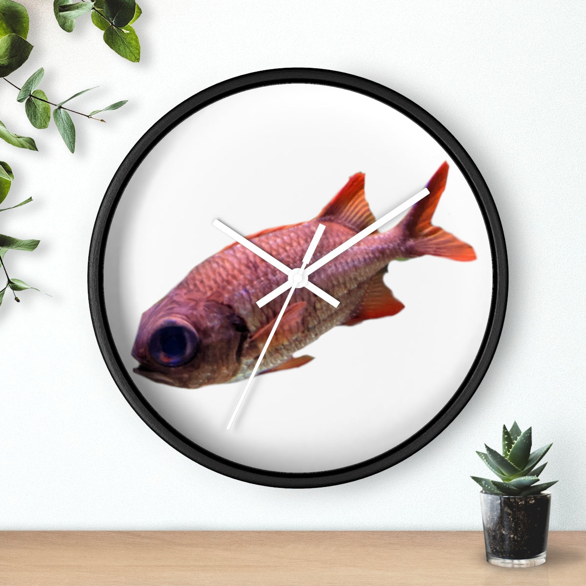 A colorful wall clock featuring a vibrant fish design, set in a wooden frame with a clear plexiglass face.