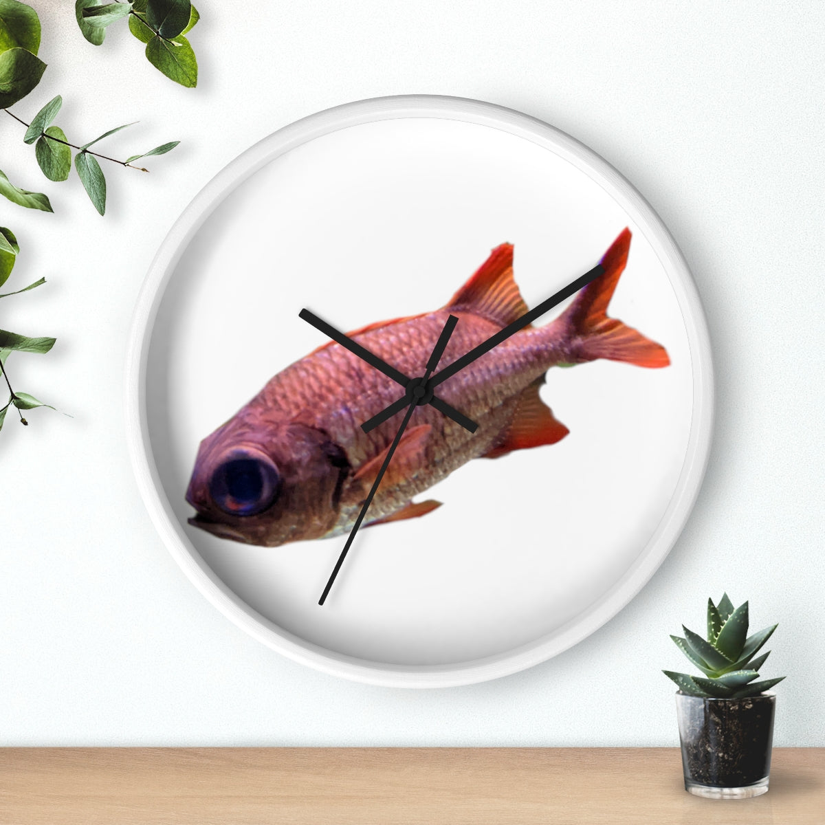 A colorful wall clock featuring a vibrant fish design, set in a wooden frame with a clear plexiglass face.