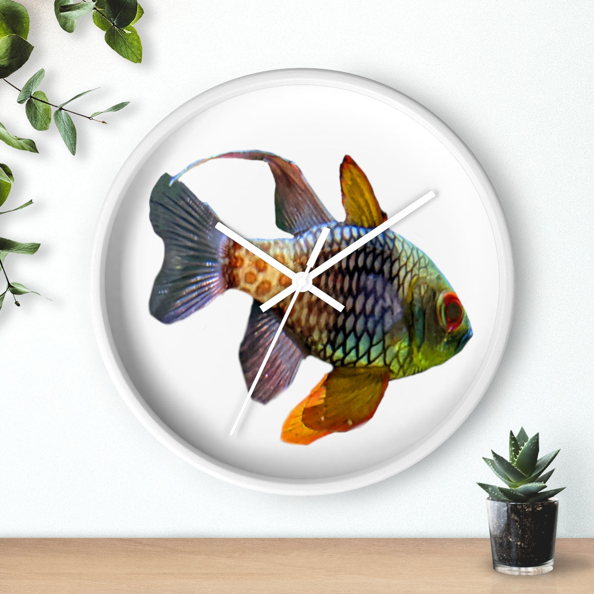 A colorful wall clock featuring vibrant fish designs, set in a wooden frame with a clear plexiglass face.