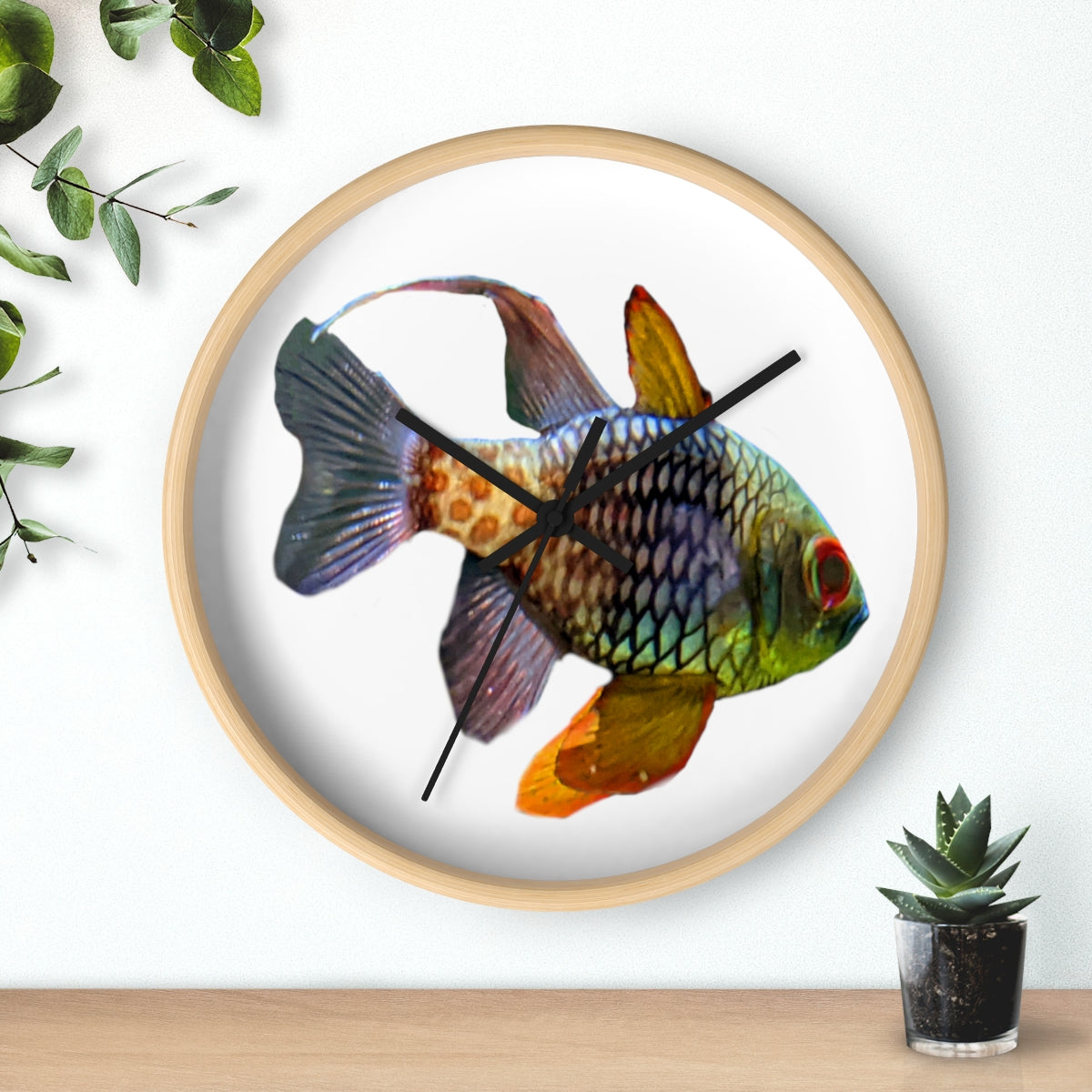 A colorful wall clock featuring vibrant fish designs, set in a wooden frame with a clear plexiglass face.