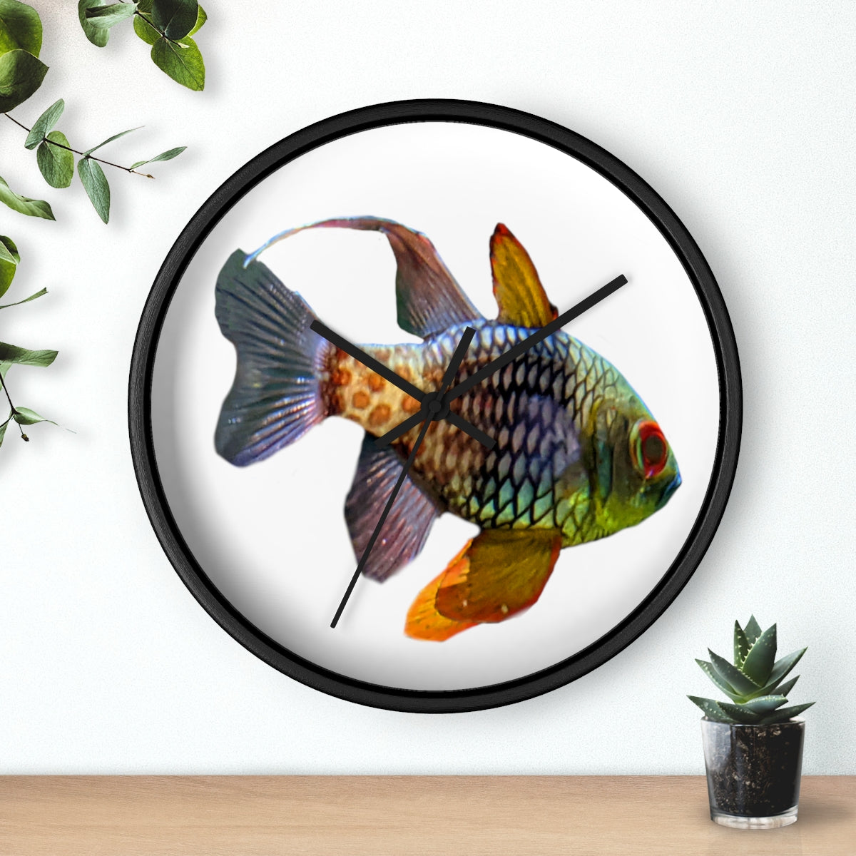 A colorful wall clock featuring vibrant fish designs, set in a wooden frame with a clear plexiglass face.