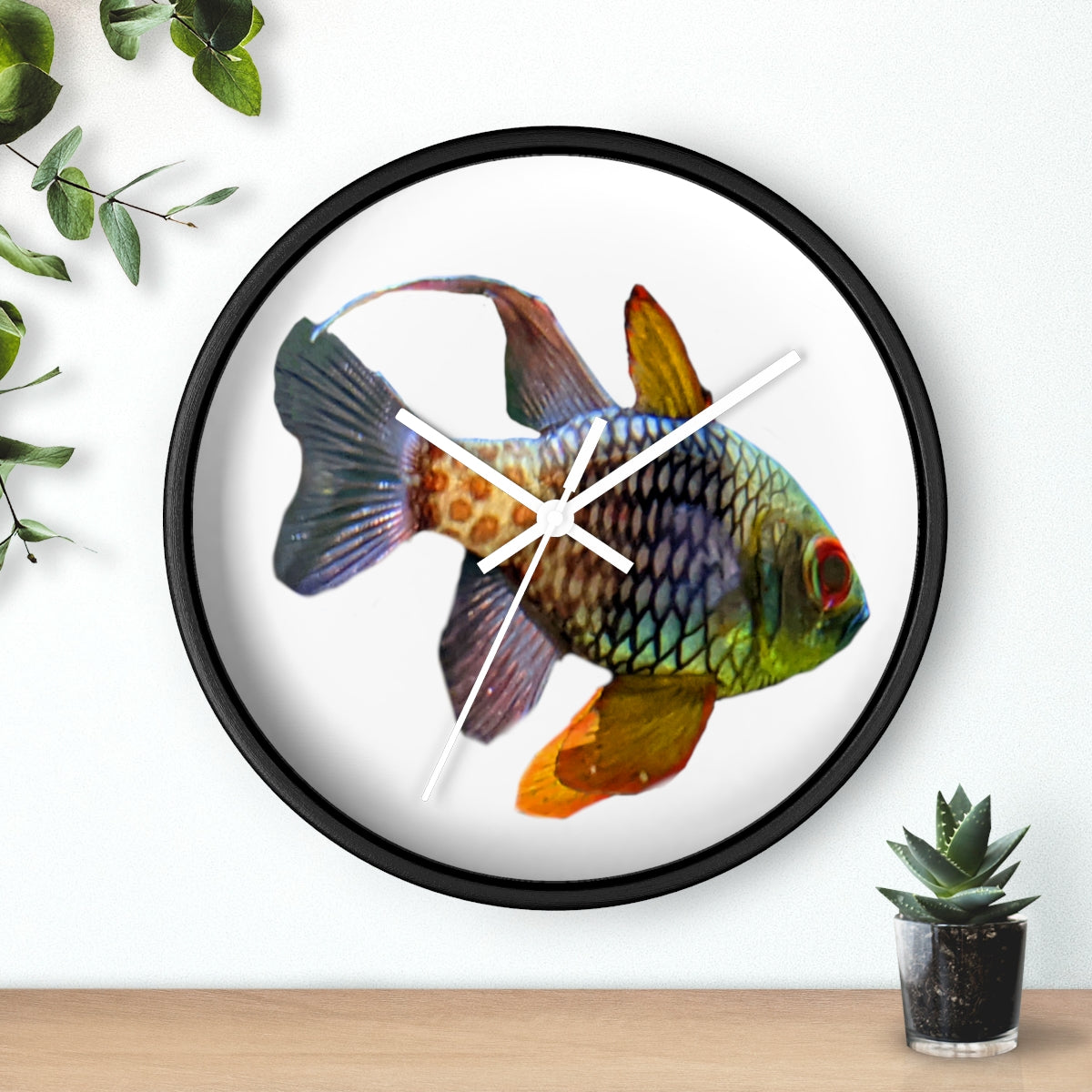 A colorful wall clock featuring vibrant fish designs, set in a wooden frame with a clear plexiglass face.