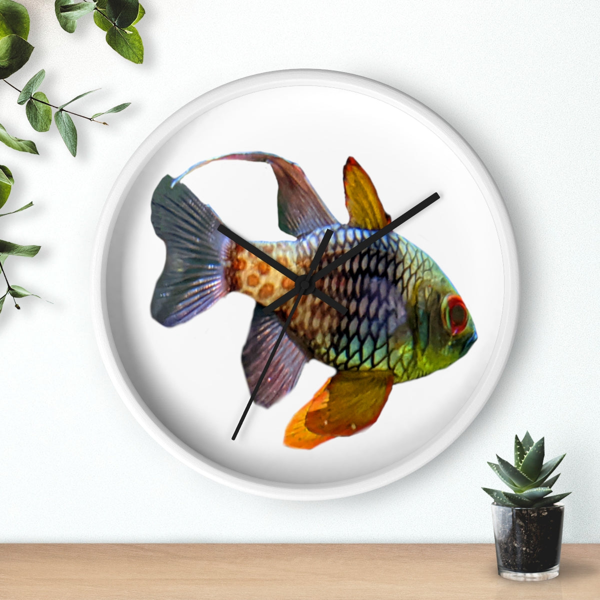 A colorful wall clock featuring vibrant fish designs, set in a wooden frame with a clear plexiglass face.