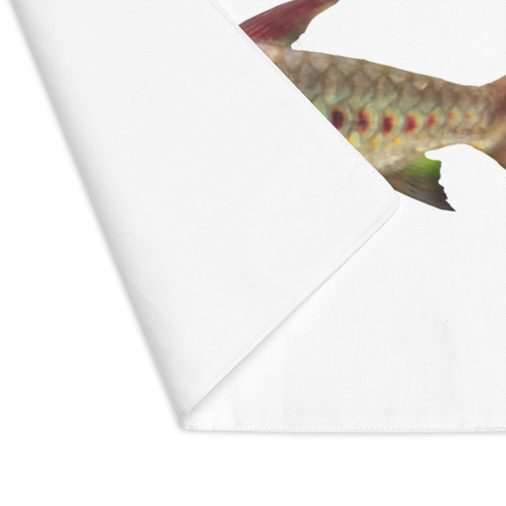 Colorful fish placemat featuring vibrant designs on one side and a natural back, made from durable cotton.